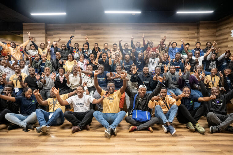 The full room of attendees at JavaConnect Kenya 2026 in Nairobi, seated and standing together for a group photo